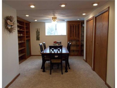 Dining Room. New carpet, new ceiling fan, recessed
