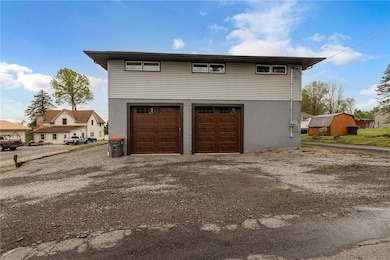 Easy access. in rear of home,  to the spectacular garage with these gorgeous 10'x10' garage doors.