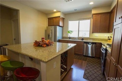Kitchen with Center Island and Wine Rack 