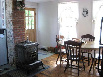 Kitchen. Near the back door are...
