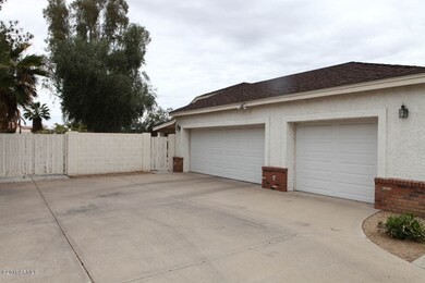 3 CAR GARAGE AND RV GATE