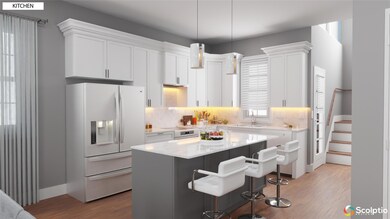 Kitchen featuring white fridge with ice dispenser