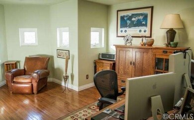 Upstairs loft complete with high end hardwood floo
