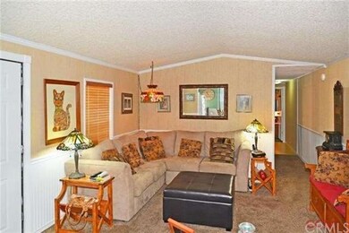 Living room and kitchen combine to create spacious
