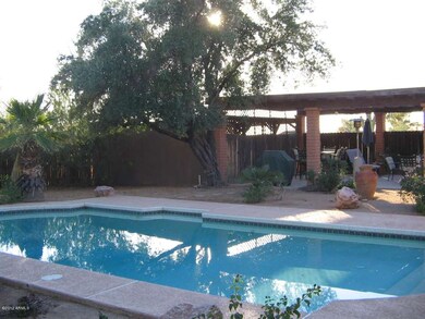 Pool and large covered patio area