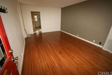 LIVING ROOM LOOKING IN FRONT DOOR