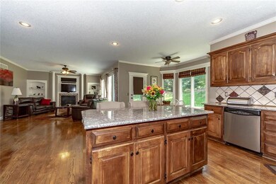 Kitchen Island with granite top and eating bar.  G