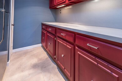 The Butler's pantry has extra cabinets and counter