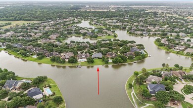 Aerial view of the lot and neighborhood. It showca