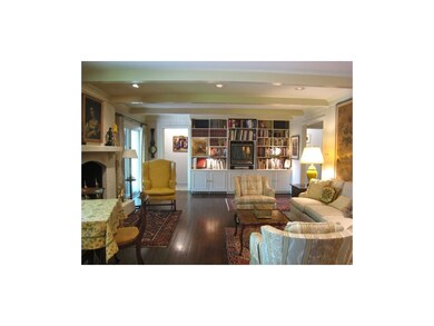 Family room with fireplace, built-ins and wet bar