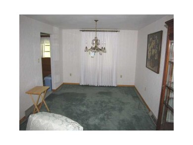 Dining Room. The dining room is open to the living
