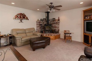 living room looking to wood stove 