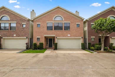 Well loved and cared for, this two-story brick hom