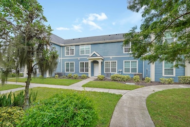 FRONT ENTRANCE FROM POND