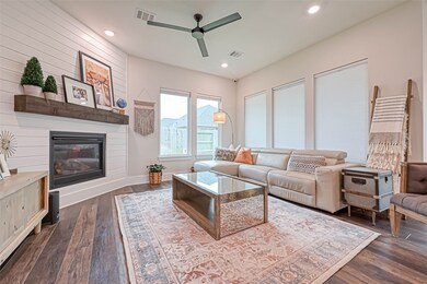 Shiplap style wall treatment add to the casual charm of the family room.