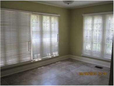sunroom off of living area, lots of natural light.