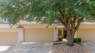 View of front of home featuring roof with shingle