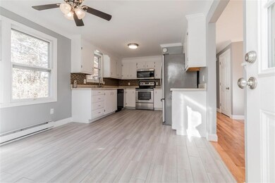 Wood look tile kitchen and dining areas