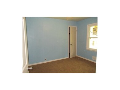 Masterbedroom with walkin closet & new windows.