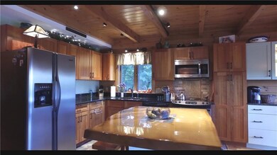 Stainless and wood with white and...