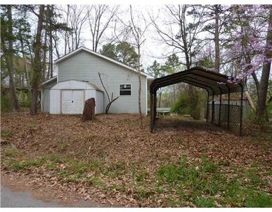 Exterior Back. Extra storage and parking