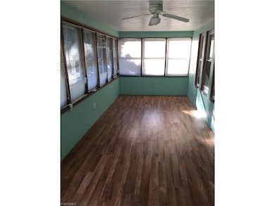 Enclosed front porch - a room for 3 seasons and so