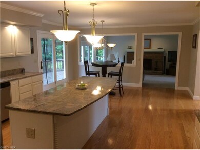 Eat-in Kitchen with door to deck and open to famil
