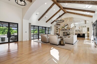 Natural light flows through the primary living roo
