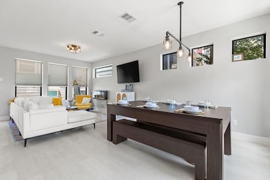 Living area with light wood-style flooring and an