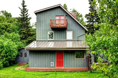Back of Home with Deck off of Master