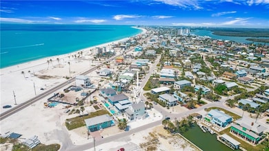 Aerial view with a beach view and a water view