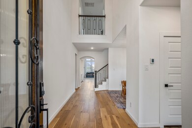 Walking in, you find a bright entryway with high c