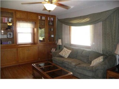 From the hardwood floors and built in cabinetry in