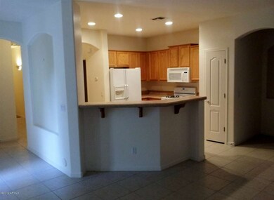 KITCHEN WITH TILE COUNTER TOPS