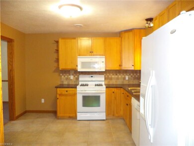 View of the kitchen from the laundry room entrance