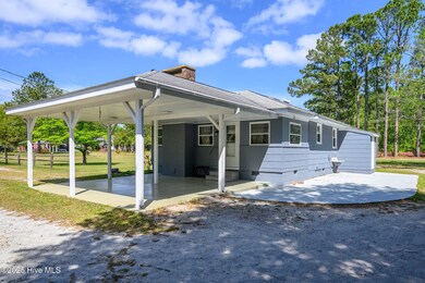Attached Carport & Back Patio