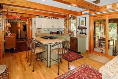 Exposed Beams & Hardwood Floors