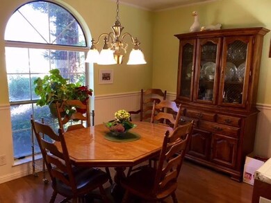 The breakfast nook features beadboard and chair ra