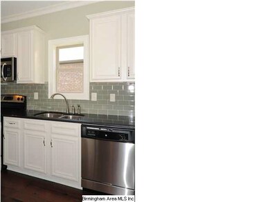Kitchen also features stainless appliances!! Photo