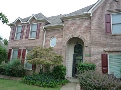 Close Up View of Stately Brick  Home. Brick Flower