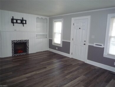 Spacious 13 x 19 Living room. Crisp clean modern c