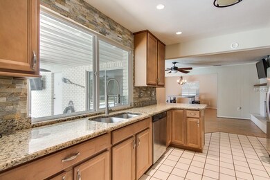 Updated Kitchen with pass-through to outside bar