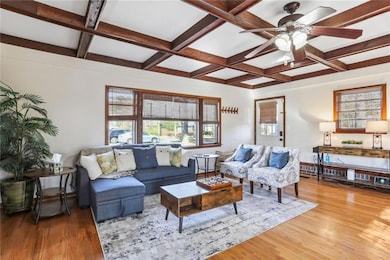 Living room with beam ceiling, coffered ceiling, l