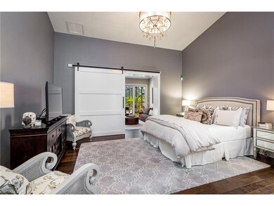 The Master Bedroom conveys elegance and calm. Thro
