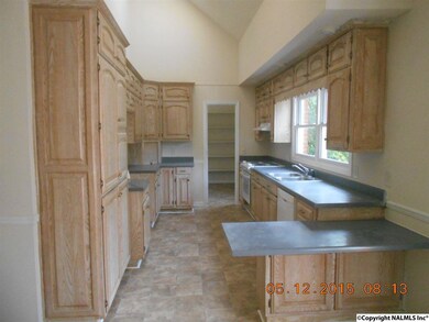Kitchen with new appliances, and paint
