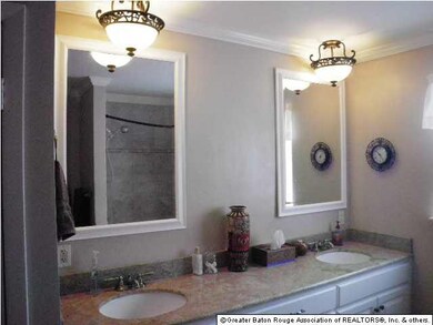 Guest/childrens upstairs bath has beautiful granit