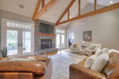 The living area extends just out the beautiful patio doors and onto the covered patio perfect for entertaining!