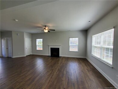 Great room view from dining area ~ photo represent