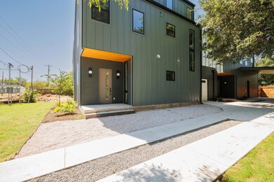 Modern home featuring board and batten siding and