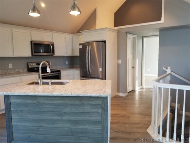 Expanded new kitchen with granite and new applianc